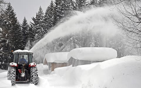 clearing roads - Credit: HARALD SCHNEIDER