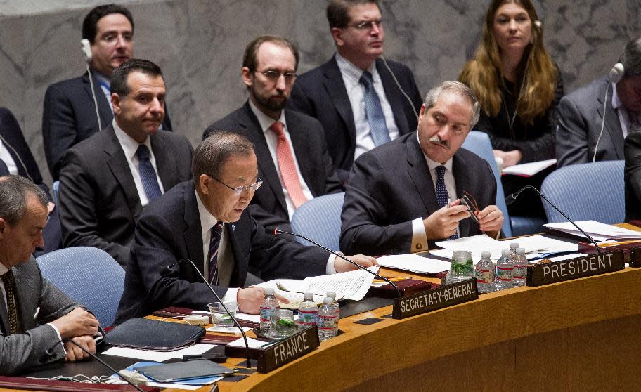 Jordanian Foreign Minister and President of the United Nations Security Council Nasser Judeh , right, listens to U.N. Secretary-General Ban Ki-moon during a meeting of the United Nations Security Council at U.N. headquarters, Monday, Jan. 20, 2014. (AP Photo/Craig Ruttle)