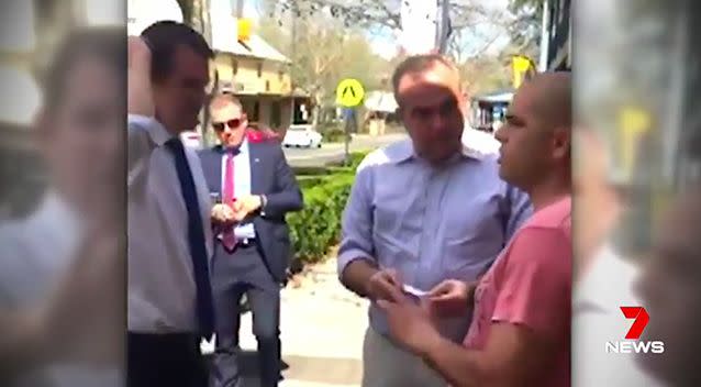 When the man refused to stop filming the premier, a police guard, tried to step in. Photo: Supplied