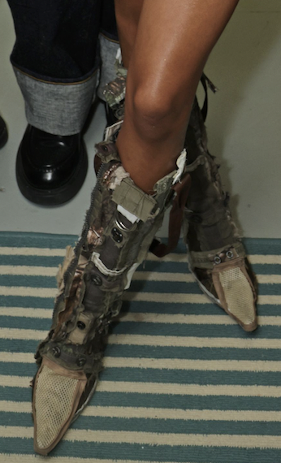 Tyla's camo patchwork boots.