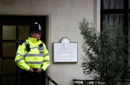 Police officers stand outside the King Edward VII's Hospital where Britain's Prince Philip recently underwent hip replacement surgery, in central London, Britain April 8, 2018. REUTERS/Henry Nicholls