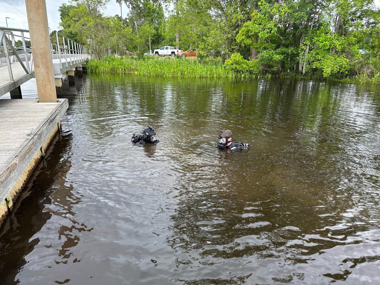 David Loveless and Tanner Loveless, divers from the Broken Link Foundation searching in Savannah, Georgia.
