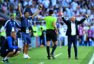 <p>The Argentina bench are certain they should have had a penalty before half-time – but the referee was unmoved </p>