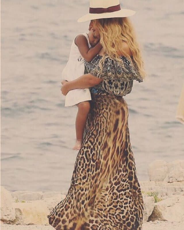 The Carter family is clearly still living their best lives. Beyoncé continues to post vacation snaps to Instagram, this time sharing cute candids of her 3-year-old daughter, Blue Ivy, and husband, Jay Z, as well as her own banging bikini bod. <strong>WATCH: Blue Ivy Shows Off Her Awesome Dance Moves During Vacation</strong> The 34-year-old singer posted photos of her family enjoying their holiday on Italy's Amalfi Coast on Saturday. One photo shows the "Drunk in Love" singer and her little girl in matching straw hats as they sit in a swimming pool aboard a luxury yacht. Another captures a sweet father-daughter moment, with the 45-year-old hip hop mogul giving Blue Ivy a kiss on her cheek. Besides the family-friendly photos, Beyoncé also showed off her "surfboart" body, posing in a sleek one-piece with a sexy plunging neckline and cutouts. This vacay has been all about romance, rest and relaxation for the Carters, as Queen Bey has been seen jet-skiing, sipping champagne and indulging in a little PDA with her hubby. <strong>WATCH: Beyoncé and Jay Z Pack on the PDA</strong> Though she's usually fiercely private, Beyoncé has been proudly showing off her family and their vacation in a number of Instagram posts these past weeks, leaving the rest of us with a serious case of FOMO. Check out more of Beyoncé's Kodak moments from her Roman holiday with Jay Z and Blue Ivy in the video below.