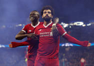 <p>Soccer Football – Champions League Quarter Final Second Leg – Manchester City vs Liverpool – Etihad Stadium, Manchester, Britain – April 10, 2018 Liverpool’s Mohamed Salah celebrates scoring their first goal with Sadio Mane REUTERS/Andrew Yates </p>