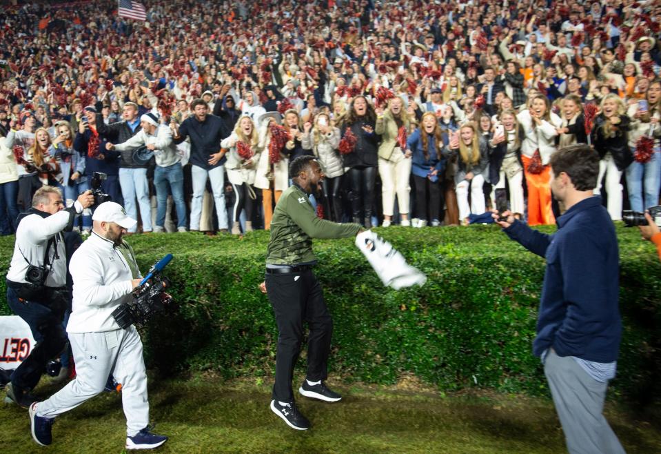 Auburn Tigers interim head coach Carnell "Cadillac" Williams celebrates after the game as Auburn Tigers take on Texas A&M Aggies at Jordan-Hare Stadium in Auburn, Ala., on Saturday, Nov. 12, 2022. Auburn Tigers defeated Texas A&M Aggies 13-10.