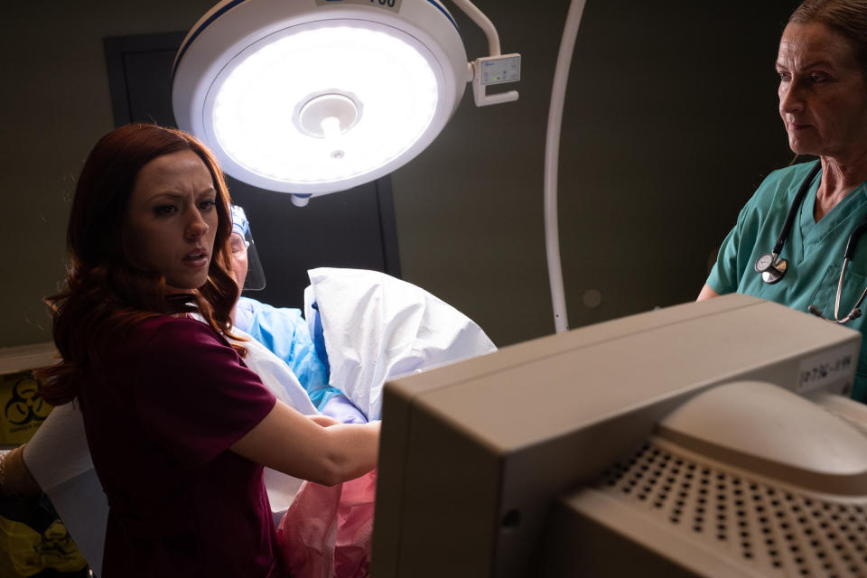 In the new film "Unplanned," Planned Parenthood clinic director Abby Johnson (Ashley Bratcher) is depicted watching an abortion in shock. (Photo: Unplanned)