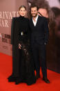 <p>Rosamund, in Givenchy haute couture, and Jamie took to the red carpet at the BFI London Film Festival to promote their new film, ‘A Private War’. <em>[Photo: Getty]</em> </p>