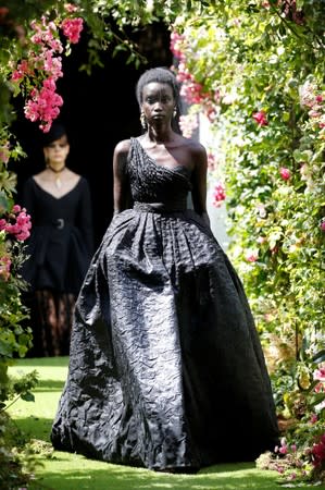 A model presents a creation by designer Maria Grazia Chiuri as part of her Haute Couture Fall/Winter 2019/20 collection show for fashion house Dior in Paris