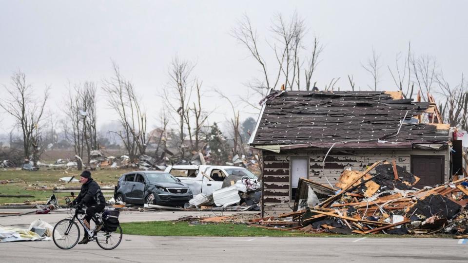 PHOTO: Homes and business take on extensive damage after an overnight severe storm Friday, March 15, 2024, in Winchester. (Grace Hollars/indystar/USA Today)