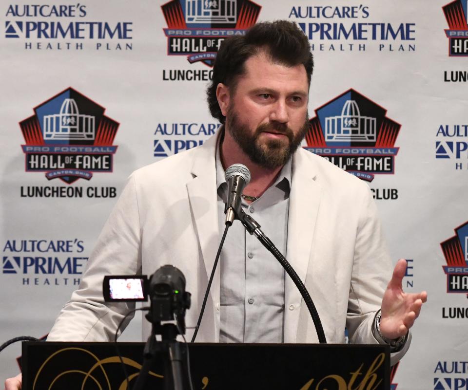Dustin Fox, along with brother, Derek Fox, speaks at the Pro Football Hall of Fame Luncheon Club. Monday, April 29, 2024.