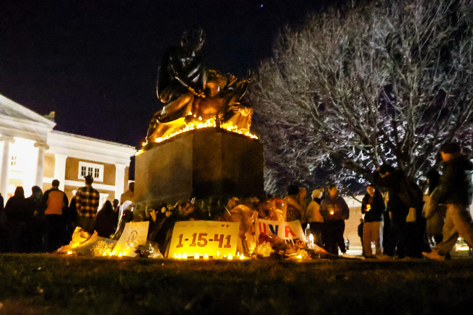 Students and community members gather for a candlelight vigil after a shooting that left three students dead the night before at the University of Virginia, Monday, Nov. 14, 2022, in Charlottesville, Va. (Shaban Athuman/Richmond Times-Dispatch via AP)
