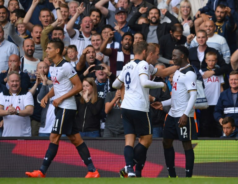 Tottenham Hotspur's Victor Wanyama (R) celebrates with teammates after scoring a goal during their English Premier League match against Crystal Palace, at White Hart Lane in London, on August 20, 2016