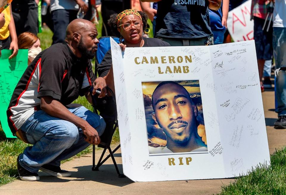 Family members of Cameron Lamb gathered at a Black Lives Matter peace protest in Mill Creek Park on the Country Club Plaza Sunday, May 31, 2020 in Kansas City. Protests have been erupting all over the country after George Floyd, an African American, died in police custody in on Memorial Day in Minneapolis. Lamb, 26, a father of three, was shot shot and killed by a Kansas City police detective last December.