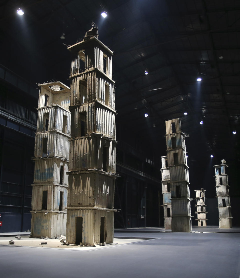 This Jan. 16, 2014 photo shows a permanent installation called "The Seven Heavenly Palaces" by the German artist Anselm Kiefer at the Hangar Bicocca museum in Milan, Italy. Visitors to Italy can feast on Renaissance and Baroque treasures, but there are increasing efforts to promote contemporary art -- including the Hangar Bicocca founded and funded by the Pirelli tire company. The former hanger is the largest privately owned contemporary art space in Europe. (AP Photo/Antonio Calanni)