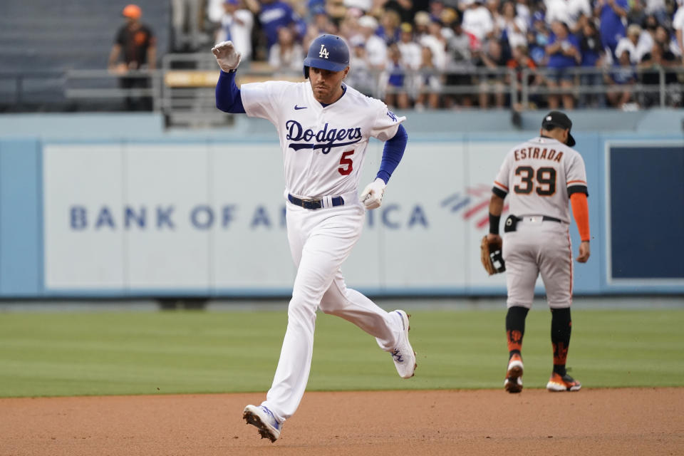 Los Angeles Dodgers' Freddie Freeman runs the bases after hitting a solo home run during the first inning against the San Francisco Giants in a baseball gamewld Thursday, July 21, 2022, in Los Angeles. (AP Photo/Marcio Jose Sanchez)