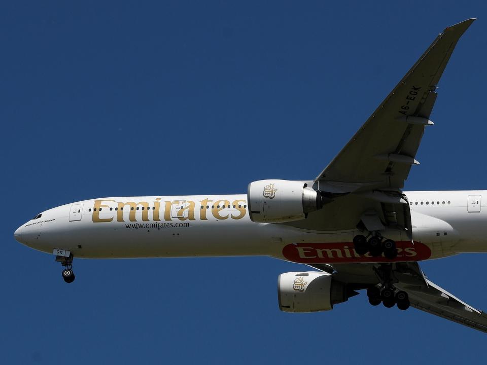 FILE PHOTO: An Emirates passenger plane comes in to land at Heathrow airport during the coronavirus pandemic, London, Britain, May 21, 2020. REUTERS/Toby Melville 