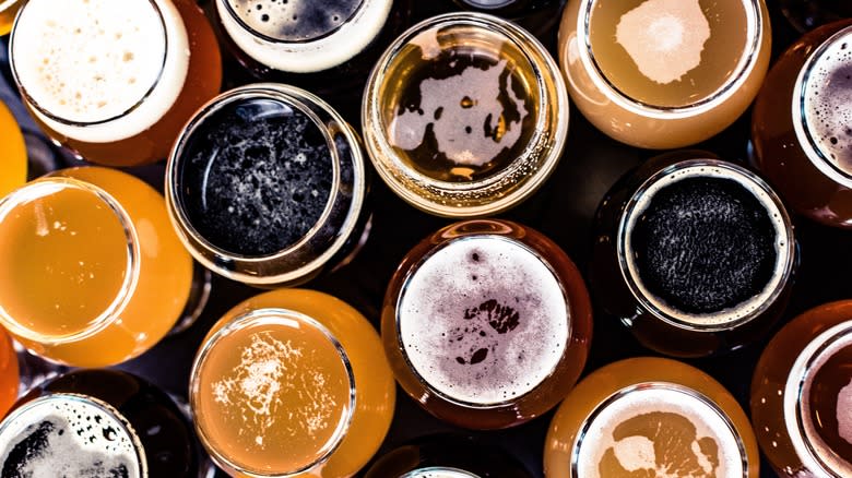 Overhead view of gold, brown, and amber beers