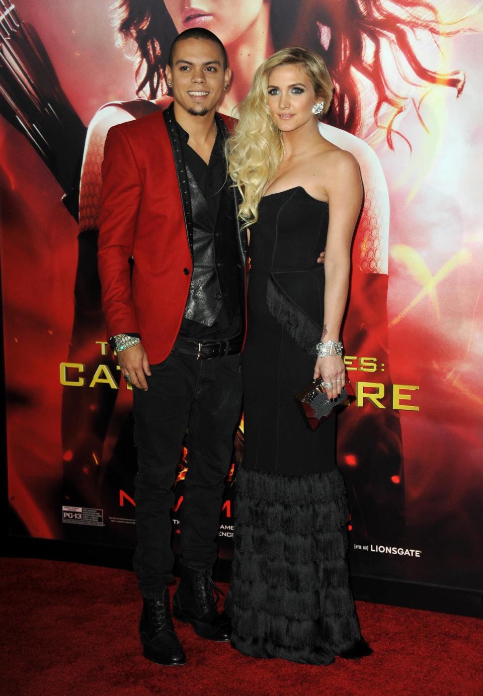 FILE - This Nov. 18, 2013 file photo shows Ashlee Simpson, right, and Evan Ross at the premiere of "The Hunger Games: Catching Fire" in Los Angeles. Simpson is engaged to boyfriend Evan Ross, who is the son of Diana Ross. The pair announced the news on Twitter Monday, Jan. 13, 2014, confirmed Simpson’s publicist Janet Ringwood. Simpson was previously married to Fall Out Boy bassist Pete Wentz. They have a five-year-old son named Bronx. Ross is an actor who will appear in the final two installments of “The Hunger Games.”(Photo by Jordan Strauss/Invision/AP, File)