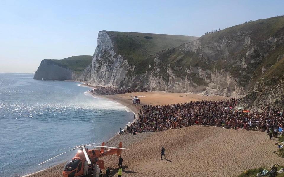 The scene at the beach at Durdle Door in Dorset on Saturday when three people were injured