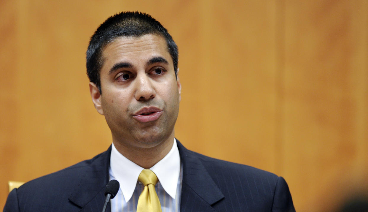 FILE – In this Friday, Aug. 9, 2013, file photo, Federal Communications Commission Commissioner Ajit Pai speaks during an FCC meeting in Washington.(AP Photo/Susan Walsh, File)