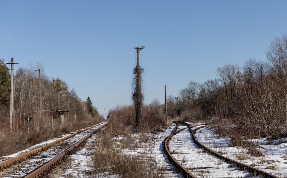  An abandoned railway is seen in the Chernobyl zone close to the Ukraine-Belarus border crossing on Feb 13 - Chris McGrath 
