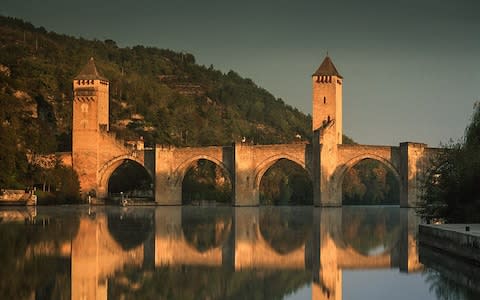 The 14th Century defensive Pont Valentre, over the River Lot - Credit: Derry Brabbs