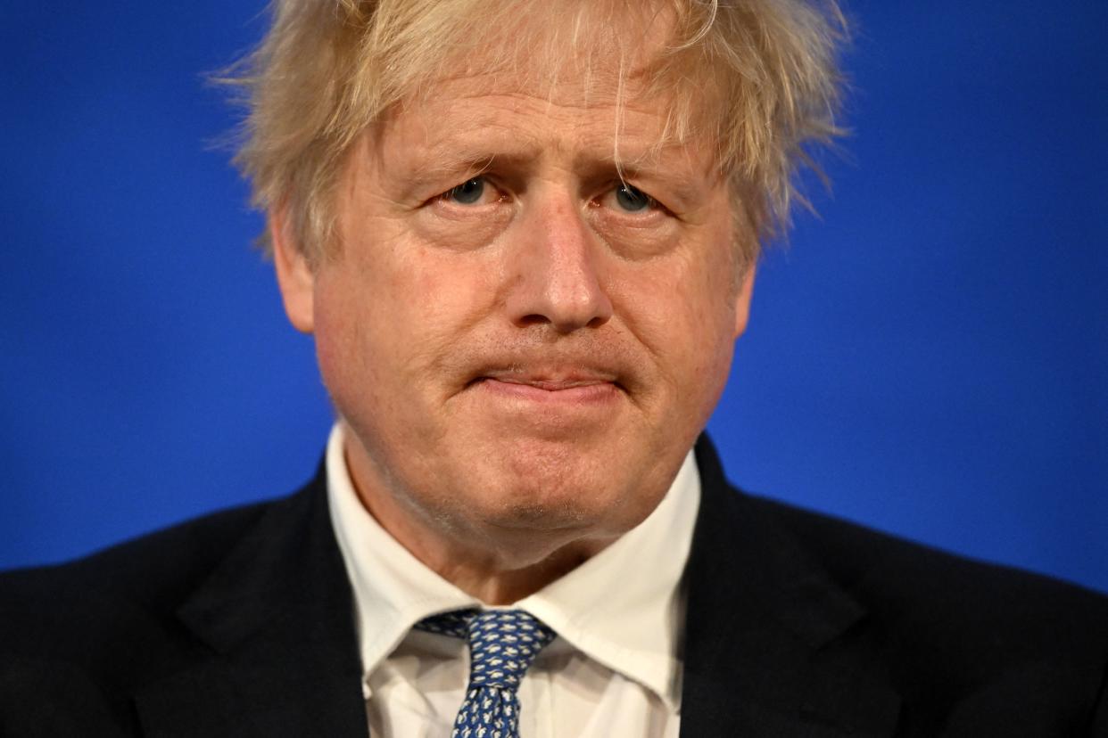 Britain's Prime Minister Boris Johnson speaks during a press conference in the Downing Street Briefing Room in central London on May 25, 2022, following the publication of the Sue Gray report. - UK Prime Minister Boris Johnson rejected calls to resign after an inquiry Wednesday found that he presided over a culture of lockdown-breaking parties that featured drunken fighting among staff. Johnson is among dozens of people in Downing Street who have received police fines for breaching Covid regulations since 2020 -- making Number 10 the most penalised address in the entire country. (Photo by Leon Neal / POOL / AFP) (Photo by LEON NEAL/POOL/AFP via Getty Images)