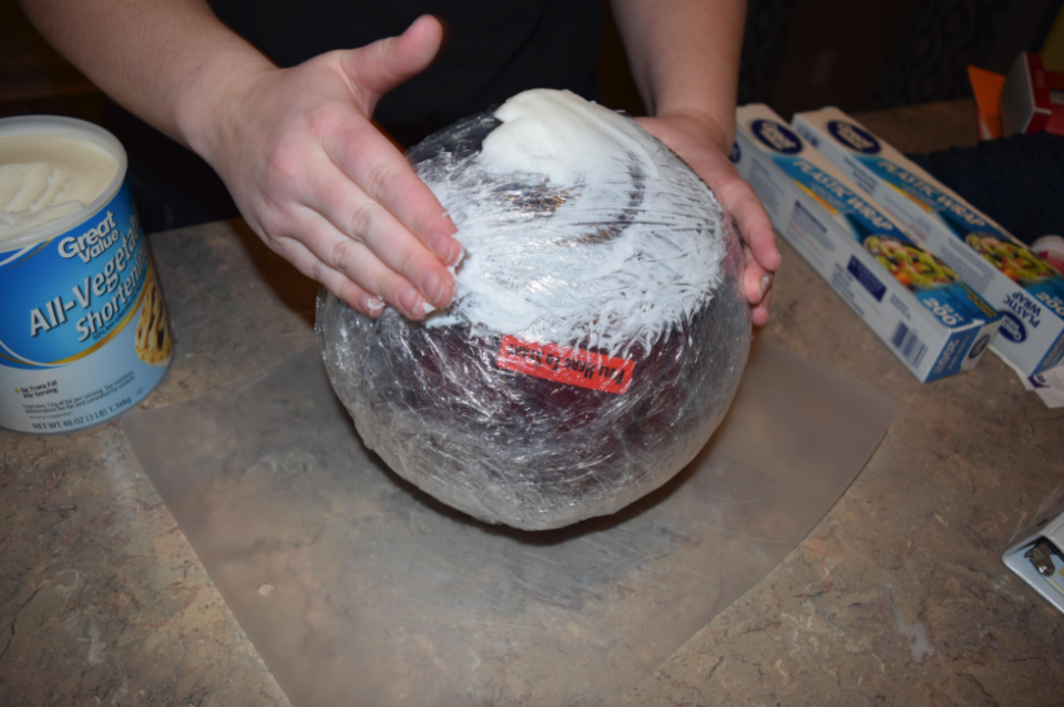 Yep, that's a layer of fat being smeared on the bowling ball. Photo: Imgur