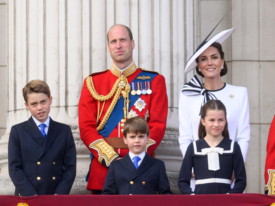 Prince George of Wales, Prince William, Prince of Wales, Prince Louis of Wales, Princess Charlotte of Wales and Catherine, Princess of Wales on the balcony of Buckingham Palace during Trooping the Colour on June 15, 2024 in London, England. Trooping the Colour is a ceremonial parade to celebrate the official birthday of the British monarch. The event features over 1,400 soldiers and officers accompanied by 200 horses. More than 400 musicians from ten different bands and corps of drums march and play in perfect harmony. (Photo by Karwai Tang/WireImage)