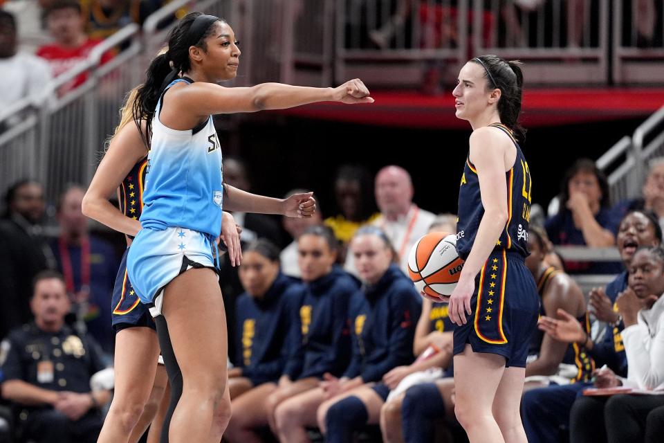 INDIANAPOLIS, INDIANA - JUNE 16: Angel Reese #5 of the Chicago Sky reacts after fouling Caitlin Clark #22 of the Indiana Fever during the second half at Gainbridge Fieldhouse on June 16, 2024 in Indianapolis, Indiana.