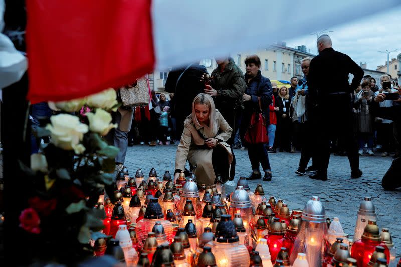 Mourners gather to hold a vigil for the Polish aid worker Damian Sobol who was killed by the Israeli army in Gaza, in Przemysl