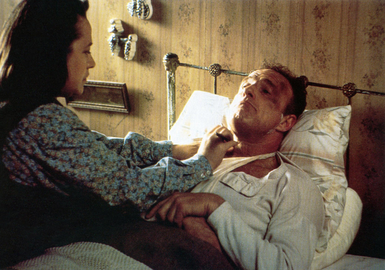 MISERY, from left: Kathy Bates, James Caan, 1990, © Columbia/courtesy Everett Collection