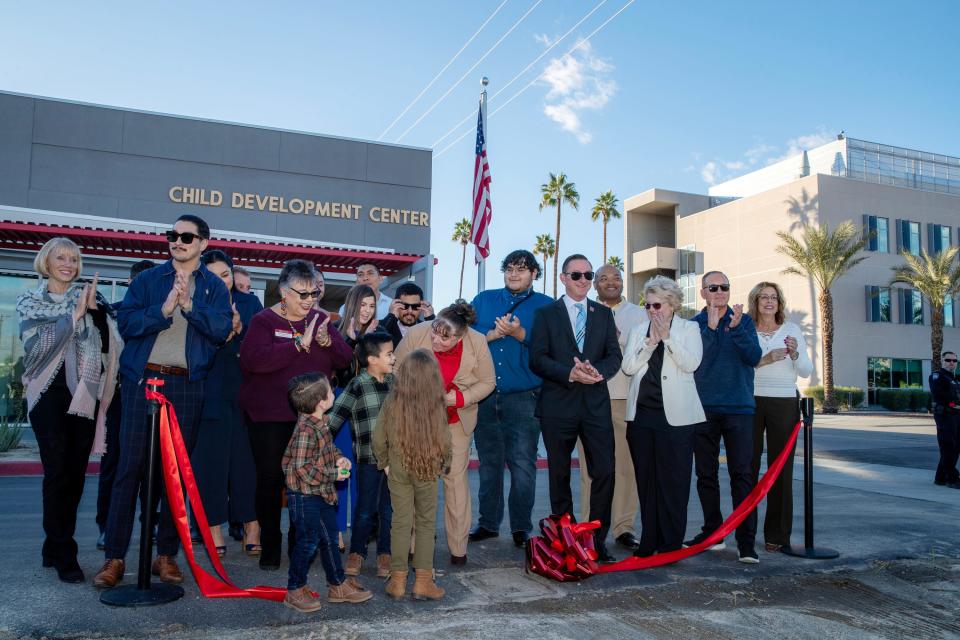 College of the Desert dignitaries and local officials celebrates the opening of the new Child Development Center with a ribbon cutting ceremony in Indio, Calif., on Tuesday, January 23, 2024.