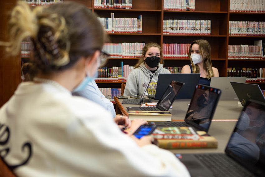 Alyssa Hoy, one of the students who created Vandegrift High School’s banned-book club, listens to another member discuss “Out of Darkness” by Ashley Hope Pérez.