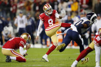 San Francisco 49ers' Robbie Gould (9) kicks the game-winning field goal from the hold of Mitch Wishnowsky, left, during the team's NFL football game against the Los Angeles Rams in Santa Clara, Calif., Saturday, Dec. 21, 2019. (AP Photo/John Hefti)