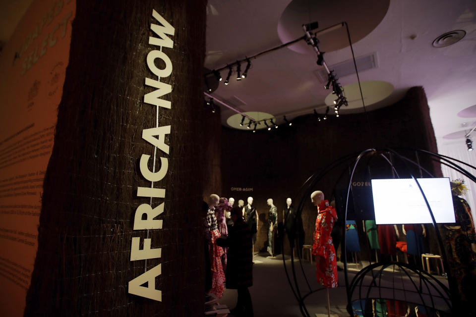 Creations of various African designers are displayed at a fashion hub in Milan, Italy, Wednesday, Feb. 19, 2020. Italy's Chamber of fashion dedicate at a space at a fashion hub, to a selection of young African brands belonging to a new generation of designers embodying the powerful identity of African fashion. (AP Photo/Luca Bruno)