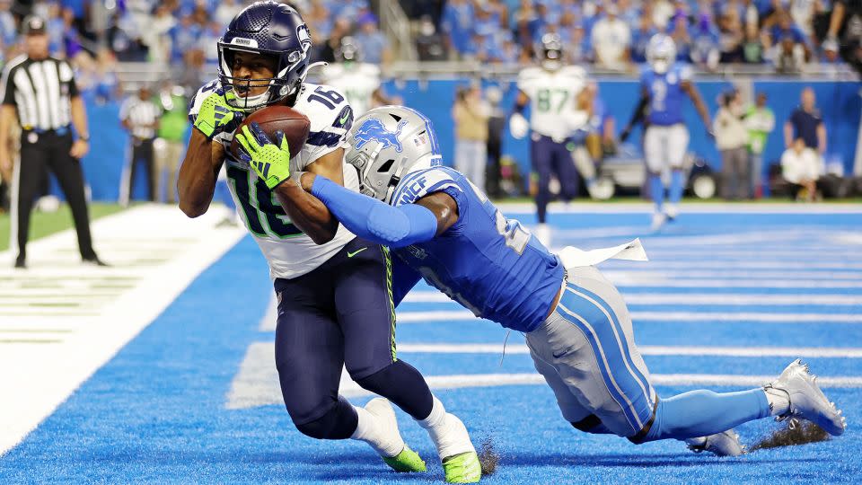 Lockett catches a touchdown pass against the Detroit Lions. - Gregory Shamus/Getty Images