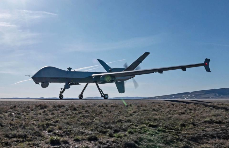 An MQ-9 Reaper lands on Highway 287 during Exercise Agile Chariot, April 30, 2023. <em>U.S. Air Force photo by Tech. Sgt. Carly Kavish</em> <em>U.S. Air Force photo by Tech. Sgt. Carly Kavish</em>