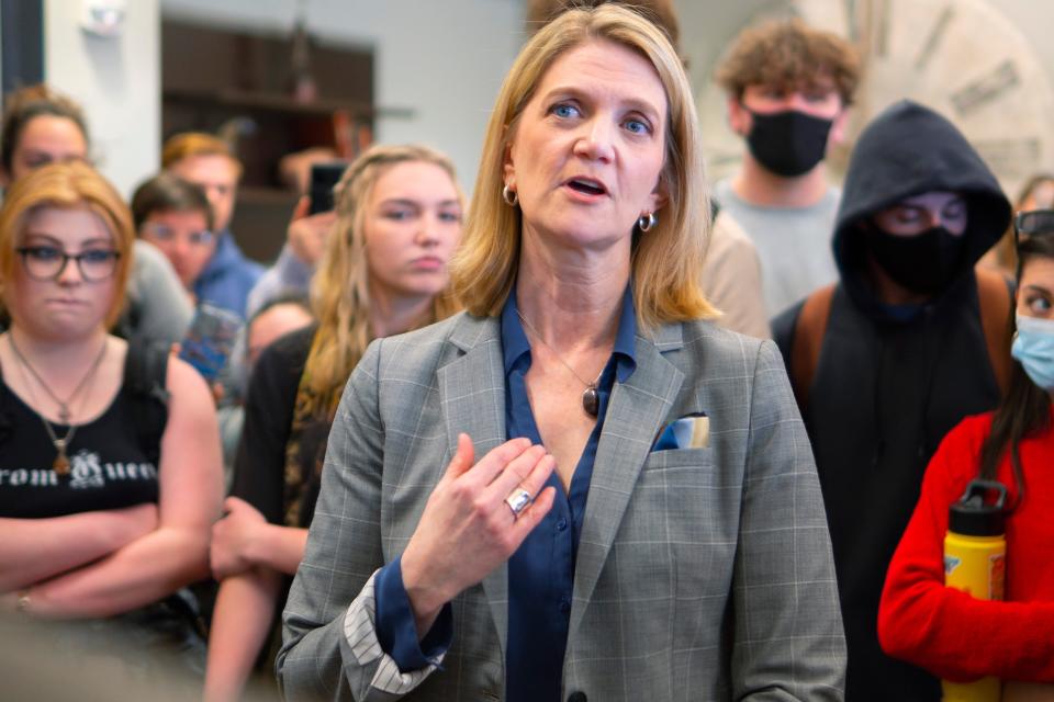 University of Central Oklahoma President Patti Neuhold-Ravikumar talks with students in her office in April after the group marched to her office in protest of planned budget cuts as well as other concerns.