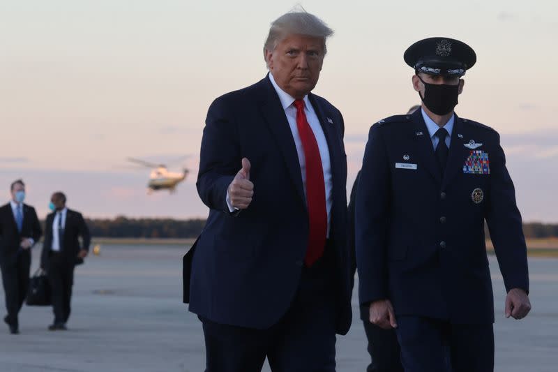 U.S. President Trump arrives to board Air Force One for travel to a campaign rally from Joint Base Andrews, Maryland