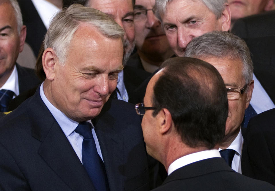 France's newly-elected President Francois Hollande, right, speaks with Jean-Marc Ayrault, Socialist group head at the National Assembly at the handover ceremony at the Elysee Palace in Paris, Tuesday, May 15, 2012. (AP Photo/Charles Platiau, Pool)