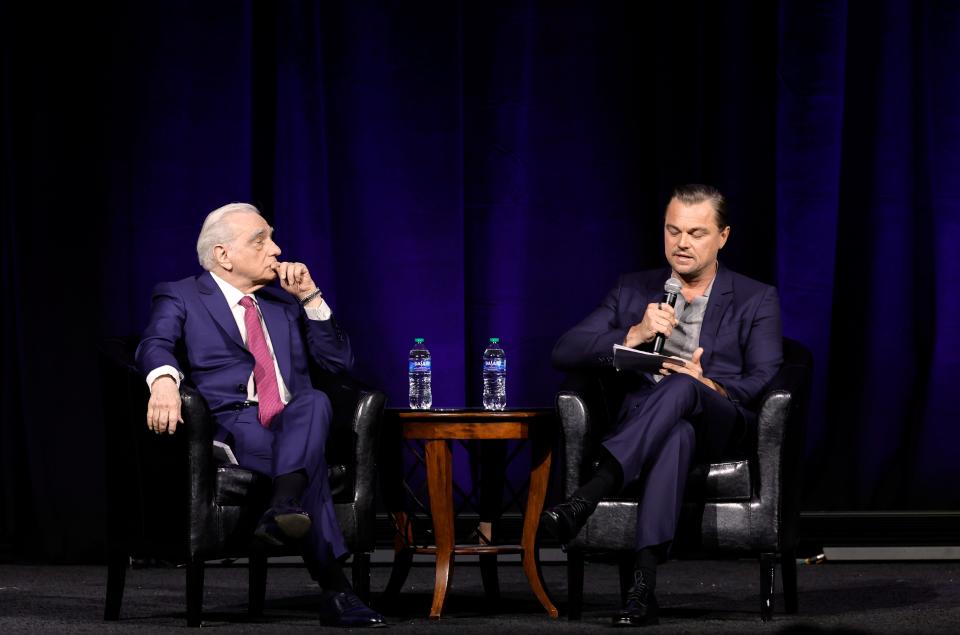 Martin Scorsese (left) converses with frequent collaborator Leonardo DiCaprio at CinemaCon.