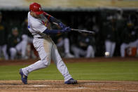 St. Louis Cardinals' Willson Contreras hits an RBI double against the Oakland Athletics during the sixth inning of a baseball game Monday, April 15, 2024, in Oakland, Calif. (AP Photo/Godofredo A. Vásquez)