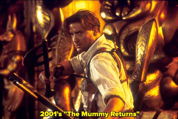 A screenshot of Fraser holding weapons in "The Mummy Returns"