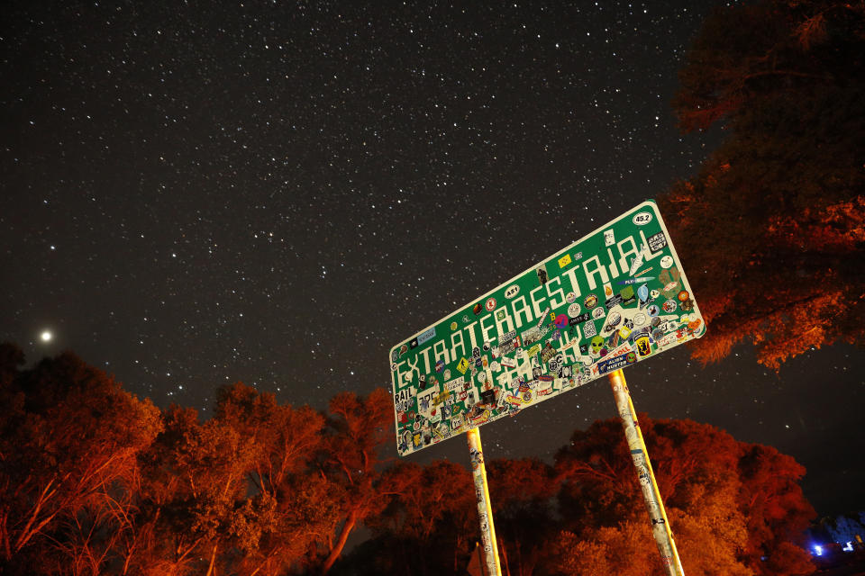 In this July 22, 2019 photo, a sign advertises state route 375 as the Extraterrestrial Highway, in Crystal Springs, Nev. The road boarders the Nevada Test and Training Range, the location of Area 51. The U.S. Air Force has warned people against participating in an internet joke suggesting a large crowd of people "storm Area 51," the top-secret Cold War test site in the Nevada desert. (AP Photo/John Locher)
