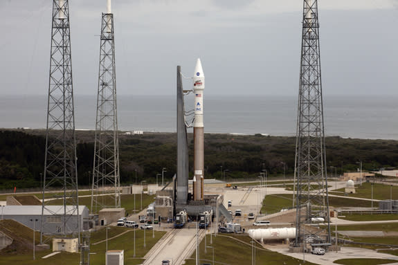 A United Launch Alliance Atlas 5 rocket stands poised to launch NASA's Mars Atmosphere and Volatile EvolutioN (MAVEN) spacecraft toward Mars from Cape Canaveral Air Force Station after being rolled out to the launch pad on Nov. 16, 2013. Lifto