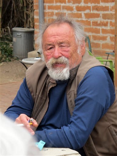 This photo provided by George Mason & Salli Slaughter shows Jim Harrison at his home in Patgonia, Ariz. Harrison, the fiction writer, poet, outdoorsman and reveler who wrote with gruff affection for the country's landscape and rural life and enjoyed mainstream success in middle age with his historical saga