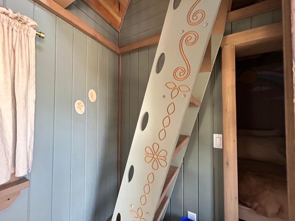 details on rapunzel's cottage ladder including holes for hands