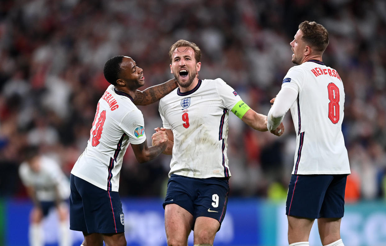 LONDON, ENGLAND - JULY 07: Raheem Sterling, Harry Kane and Jordan Henderson of England celebrate after victory in the UEFA Euro 2020 Championship Semi-final match between England and Denmark at Wembley Stadium on July 07, 2021 in London, England. (Photo by Shaun Botterill - UEFA/UEFA via Getty Images)